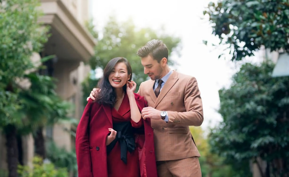 Couple walking down the street in formal elegant clothes
