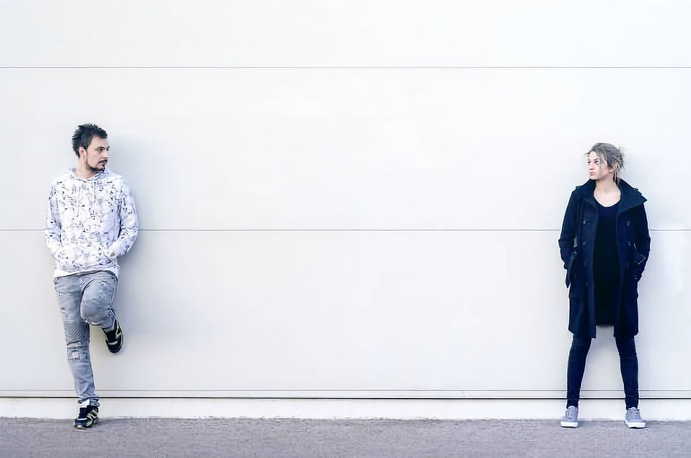 A couple looking at each other from a distance