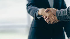 Why Your Brain Decides What a Handshake Means Before You Even Finish Watching It