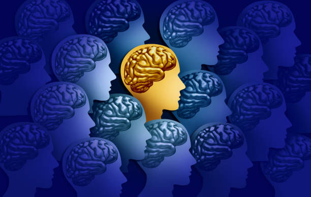 Silhouette heads with brain illustrations; one gold head stands out among blue heads, symbolizing individuality against a dark blue background.