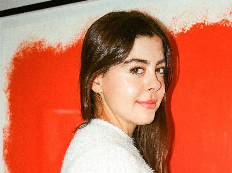 A smiling photo of Ash Moraca