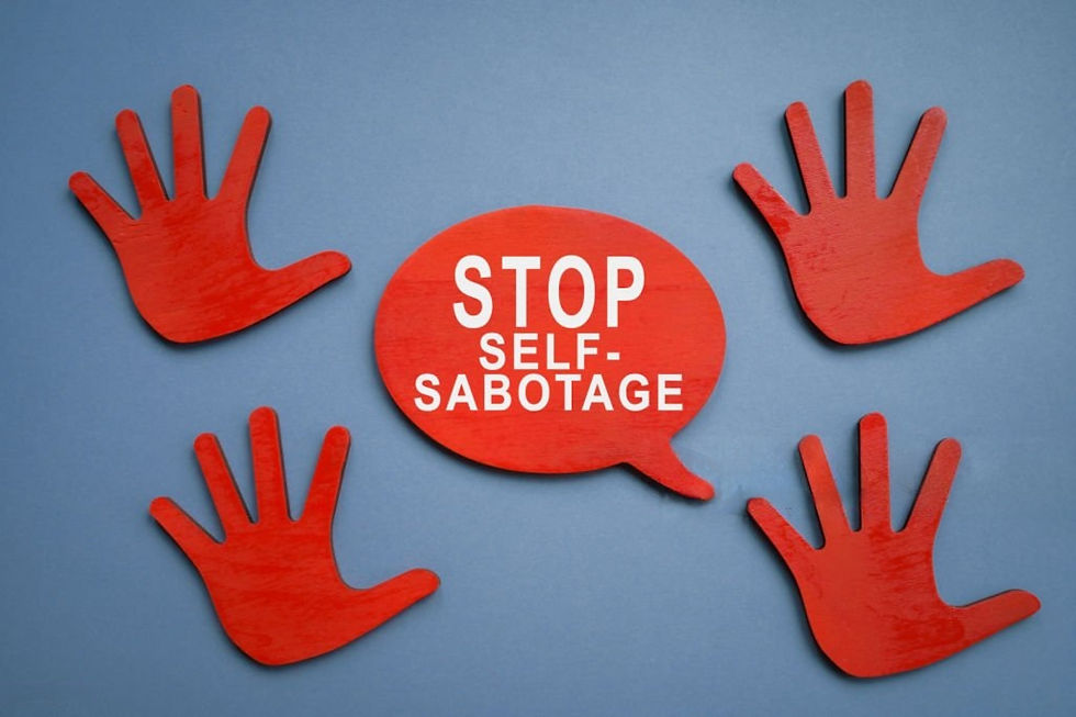 Red hands around a speech bubble reading STOP SELF-SABOTAGE on a blue background.