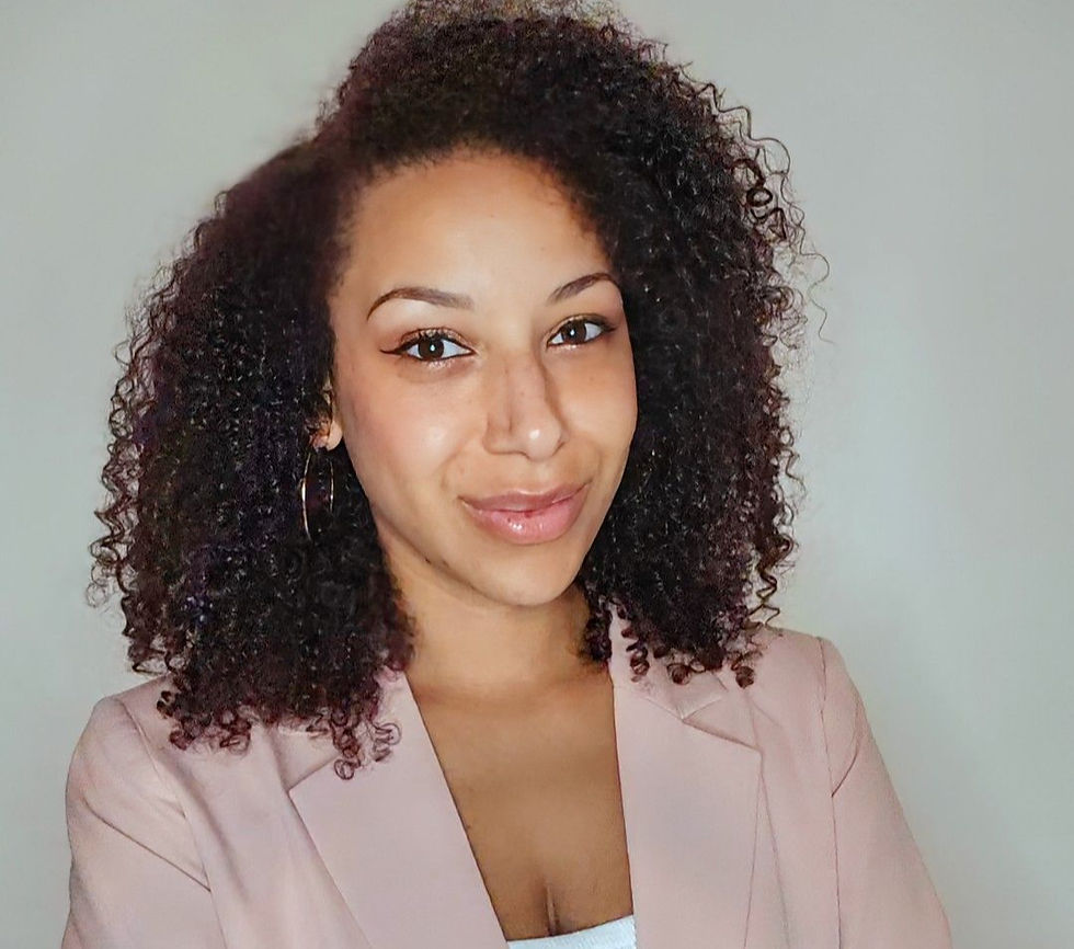 A smiling photo of Emma Abalogun