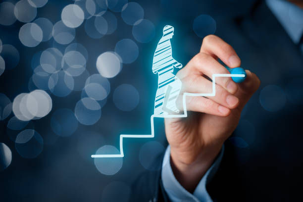 Hand drawing a blue stick figure walking up stairs against a bokeh background, symbolizing growth or progress.