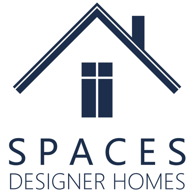 House-shaped logo with a window, chimney, and sloped roof in dark blue. Text reads "SPACES DESIGNER HOMES" below the graphic.