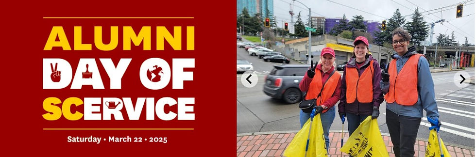 The photo shows three volunteers wearing orange safety vests and gloves, holding yellow trash bags while participating in a community cleanup effort at an urban intersection.