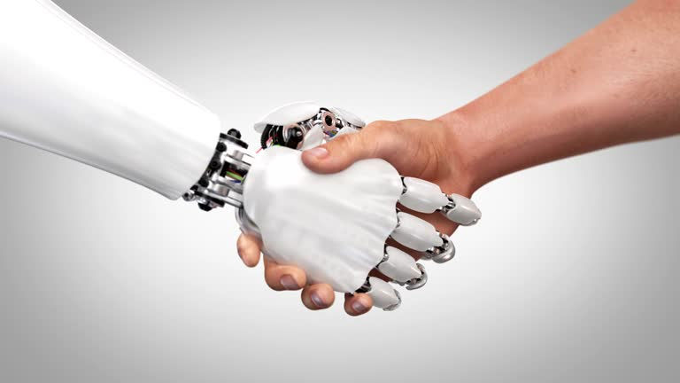 A human hand and a robotic hand are shown shaking hands, symbolising collaboration between humans and artificial intelligence.