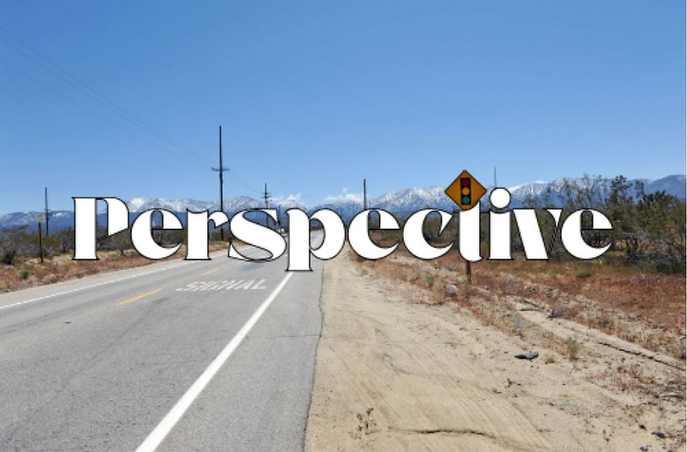Empty desert road with "Perspective" overlaid. Blue sky, mountains in the distance, road sign visible. Calm, open setting.