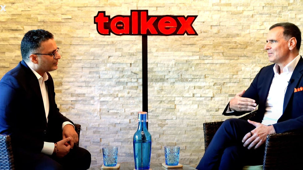 A photo of Rohit and John Iossifidis having a conversation.