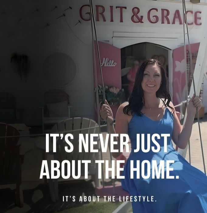 Smiling woman in blue dress on a porch swing outside GRIT & GRACE, with slogan about home and lifestyle.