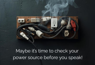 Smoke rises from an overloaded power strip plugged with various cords. Text reads: Maybe it's time to check your power source before you speak!