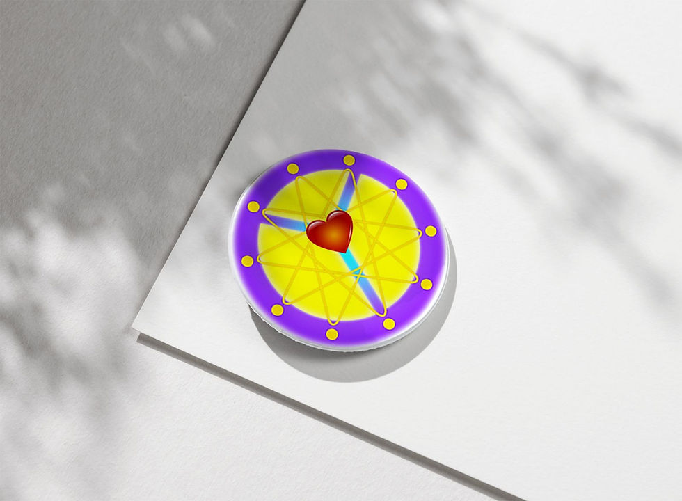 A round pin with a yellow and purple design featuring a central red heart on white paper. Shadows create a calm atmosphere.