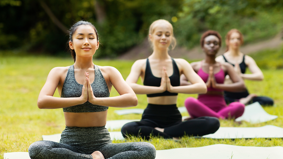 4 women on a meditating pose