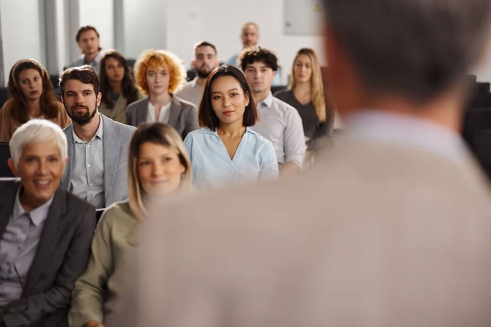 Group of business people attending a seminar in board room. 