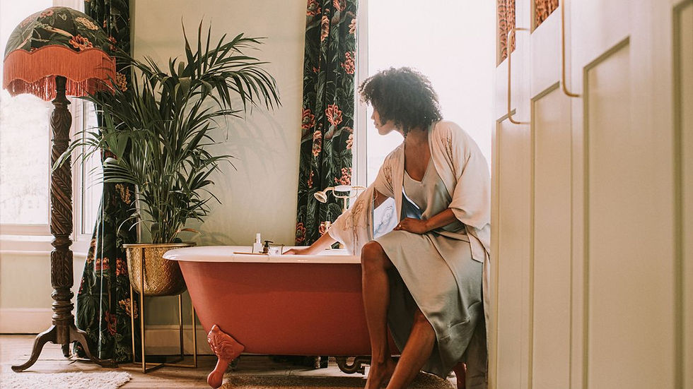 Woman preparing to take a bath