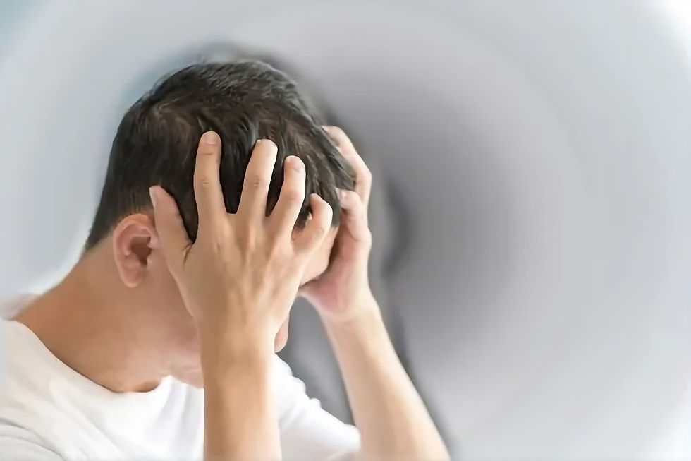 Man holding his head