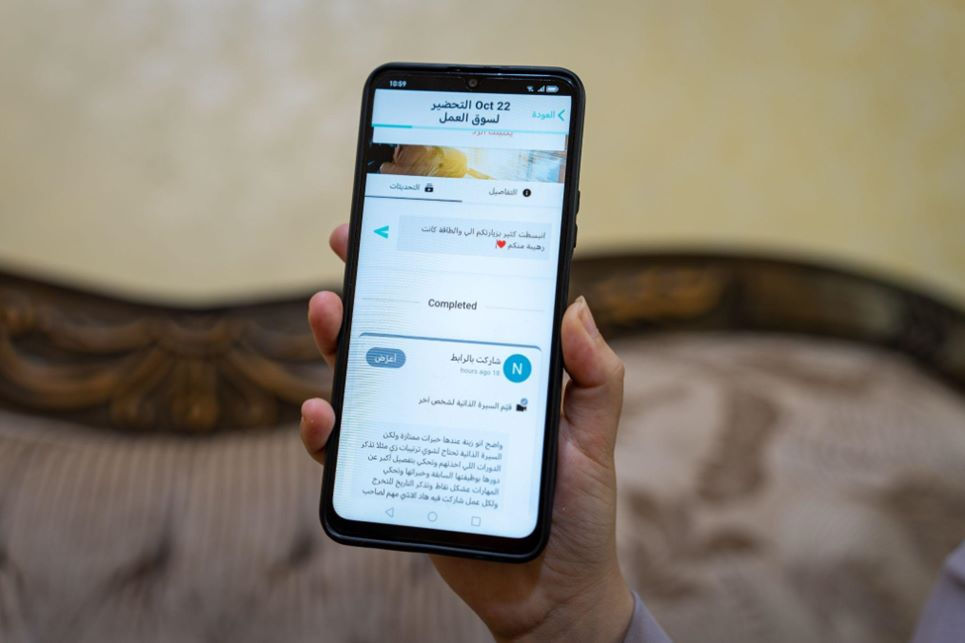Person holding smart phone