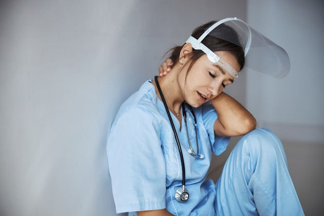 Tired young medical worker