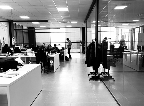 Photo of workers in office.