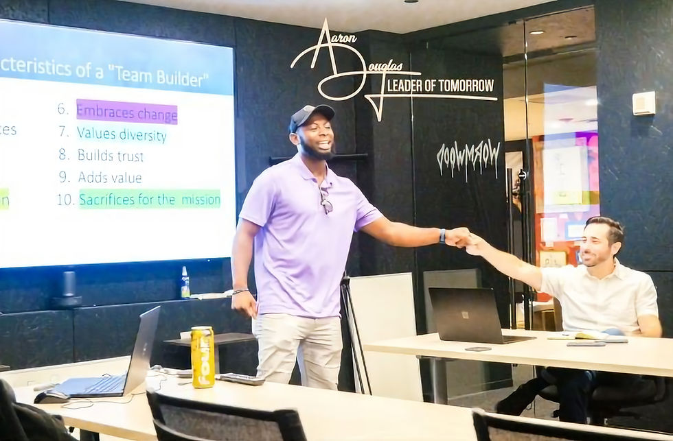 Photo of Aaron at conference room
