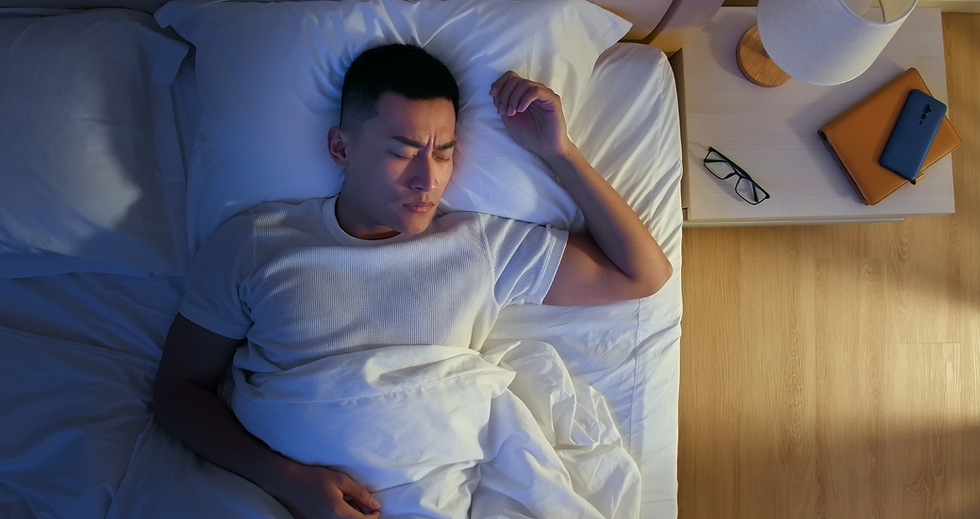 man sleeping in the bedroom