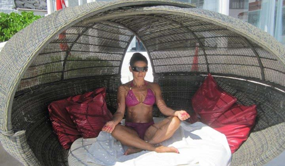 Woman meditating on a sunny weather