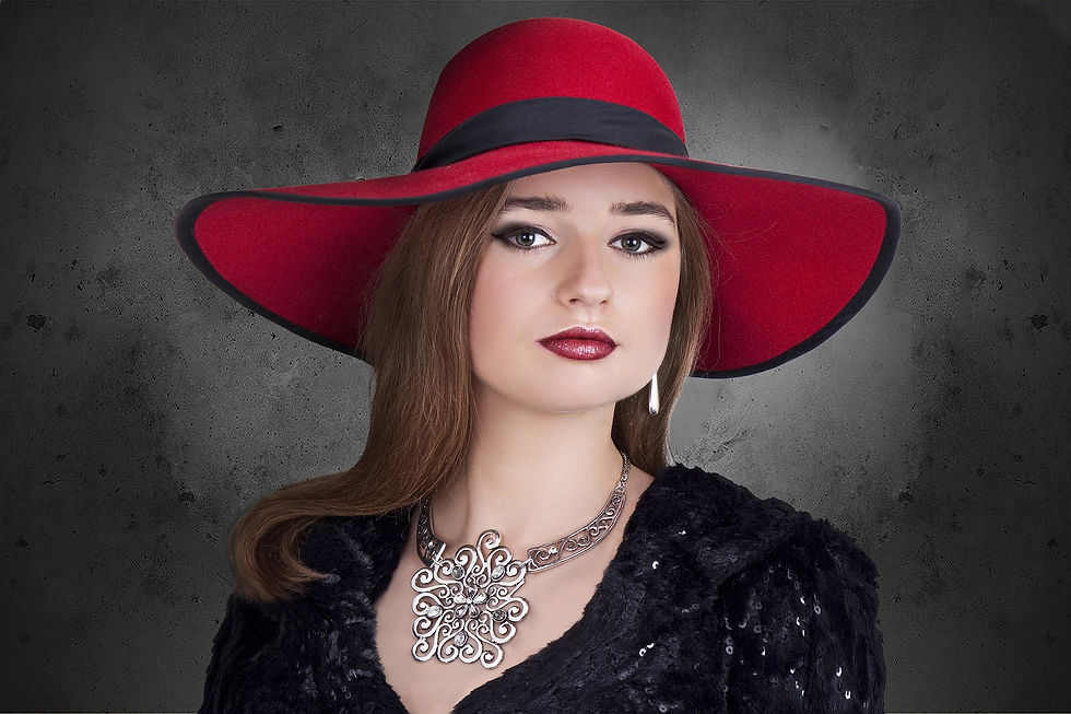 young beautiful woman wearing red hat and fashion necklace