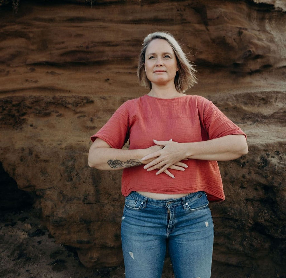 Photo of Nicole near rock