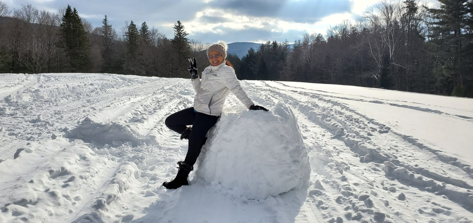 Photo of a woman on a snowy mountain
