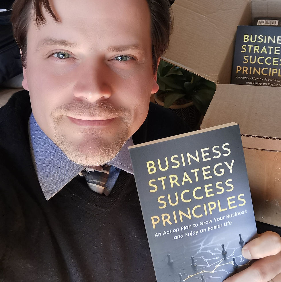 A man took a selfie holding a book