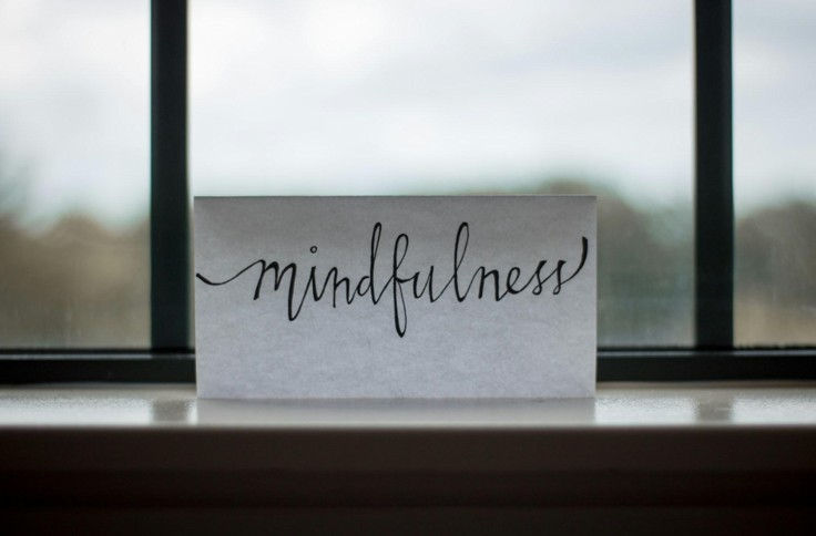 The word mindfulness written on a piece of paper