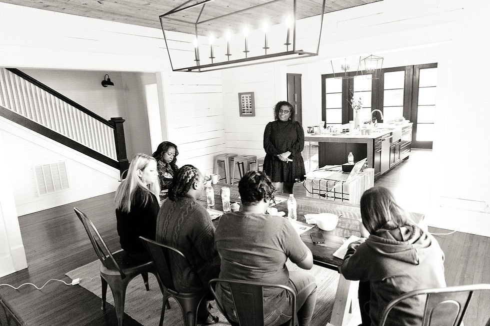 Six people eating while working inside the house