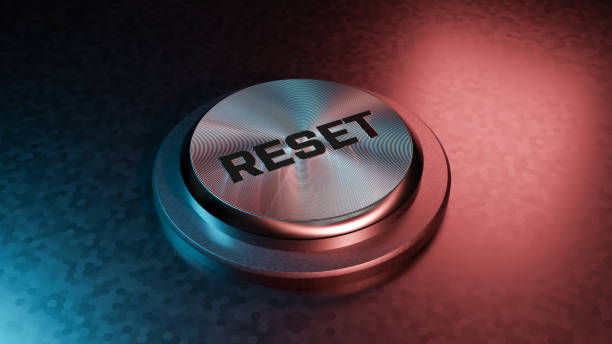 Button Reset - 3d rendered image shiny metallic button.