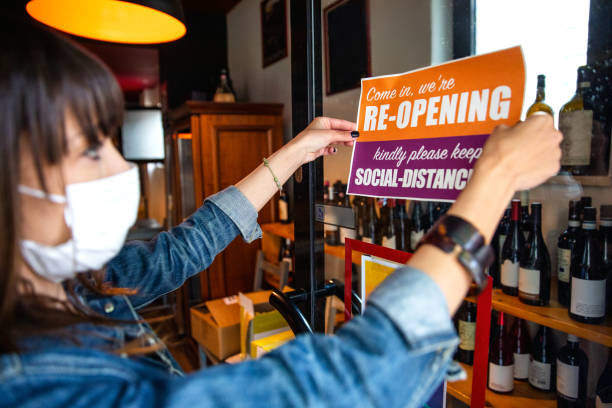 Open sign in a small business shop after Covid-19 pandemic.