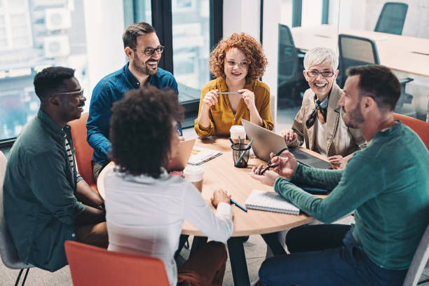 A photo of multiracial group of business people having a meeting.