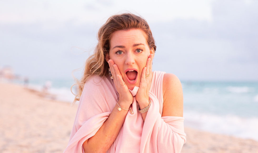 Surprise woman at the beach on a beautiful weather. 