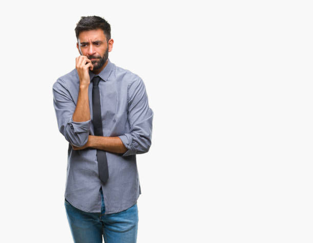 Adult hispanic business man over isolated background thinking looking tired and bored with depression problems with crossed arms.