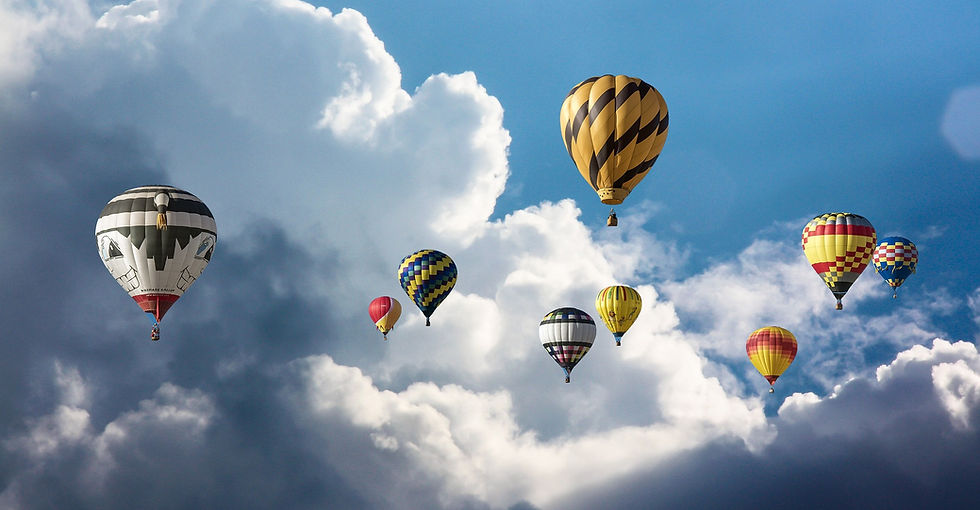 photo of hot air balloons soaring at the sky