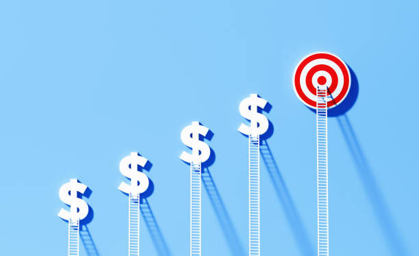 White ladders leaning onto white dollar signs and red bull's eye target on blue wall.