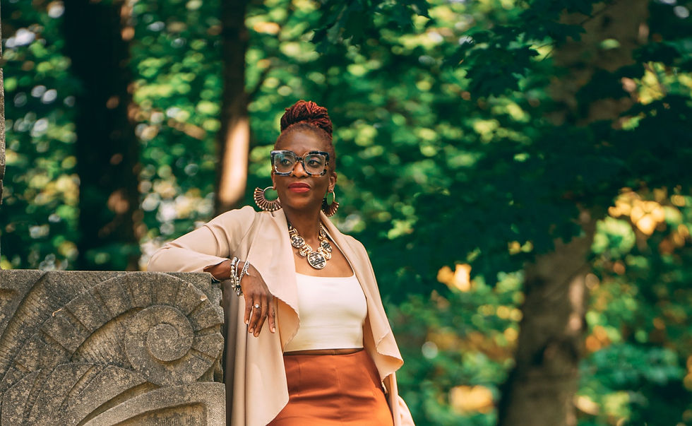 outdoor shot of standing woman in eye glasses