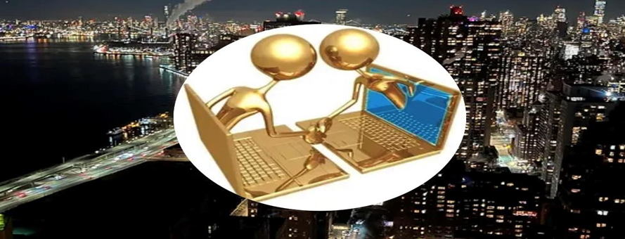 view of the at night with digital image of gold laptop
