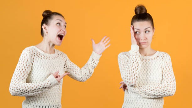 Split personality. The girl chastises herself and resists this herself.