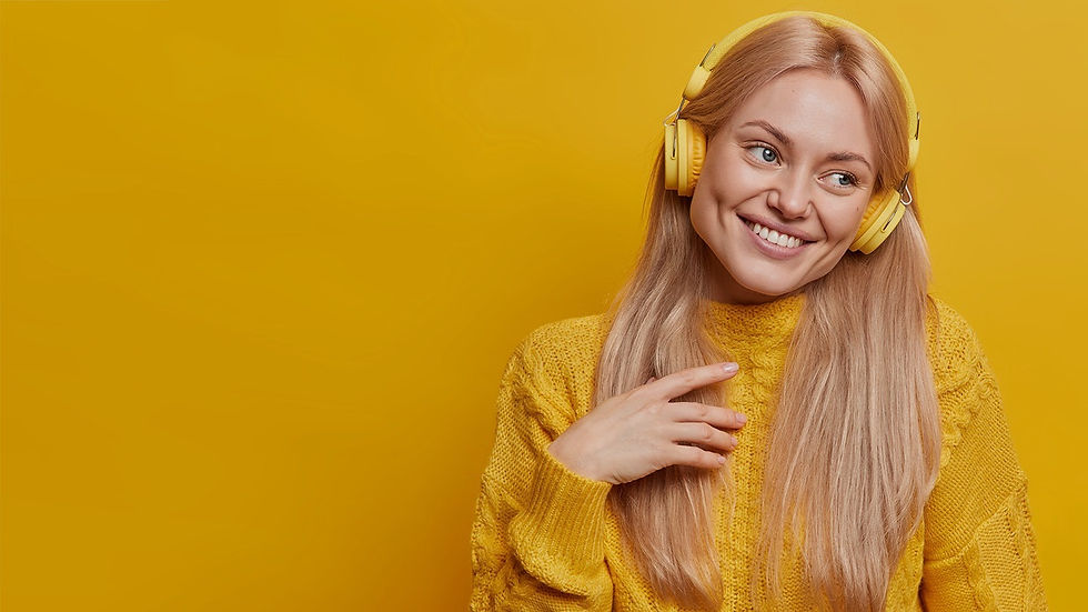 girl with headphones smiling