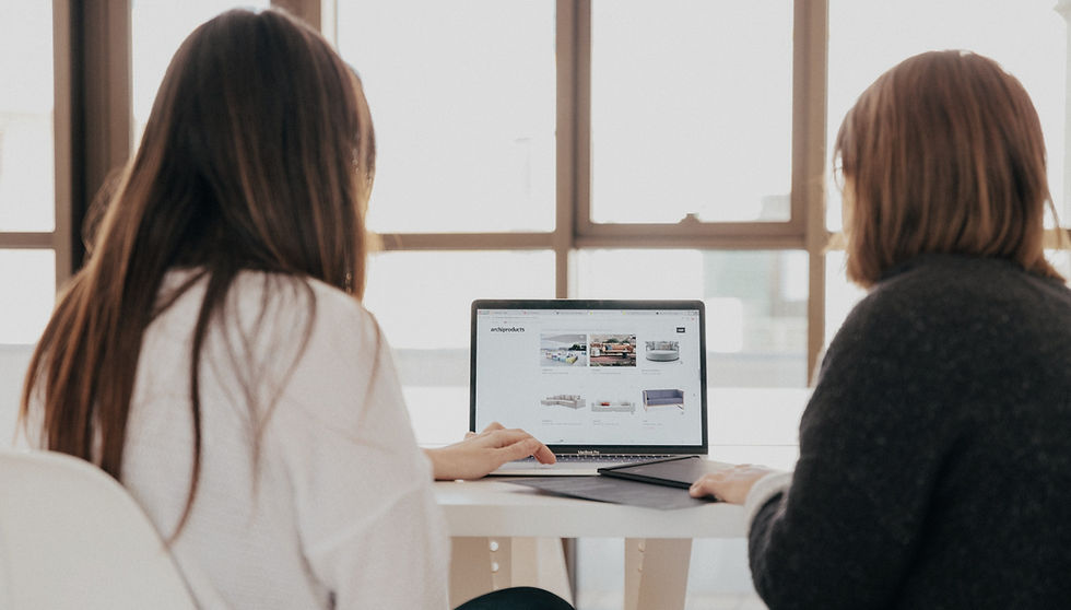 Female financial advisor reviews documents on digital tablet.