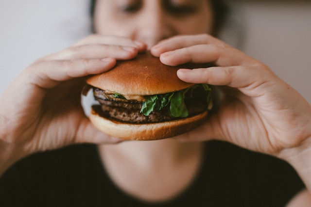 Women eating a burger